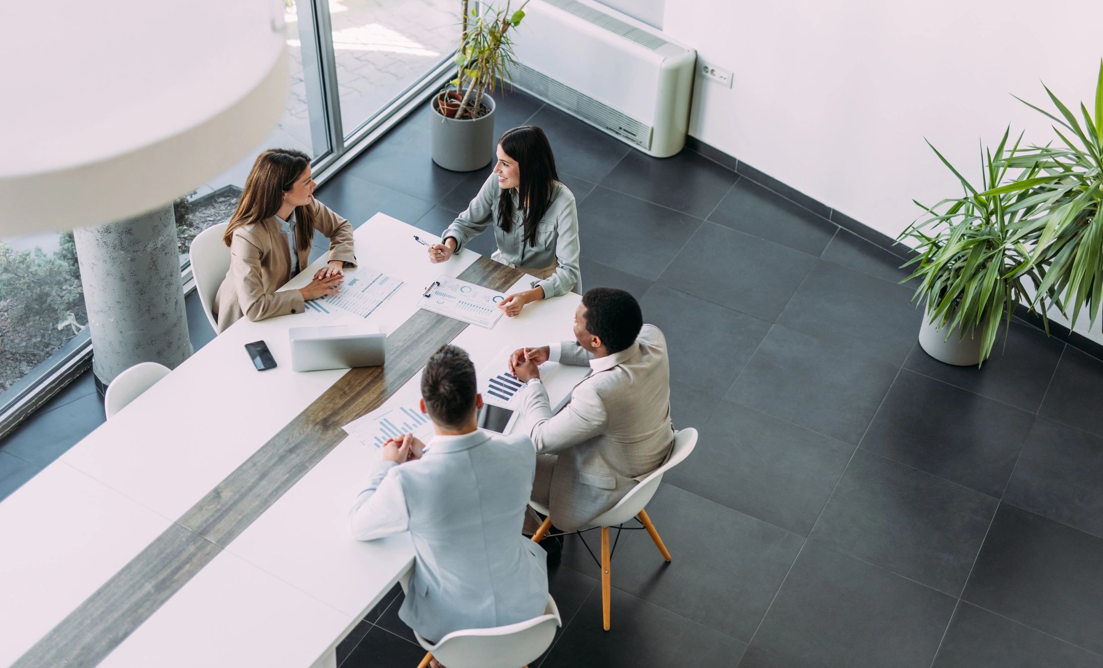 Business professionals collaborating in a boardroom meeting